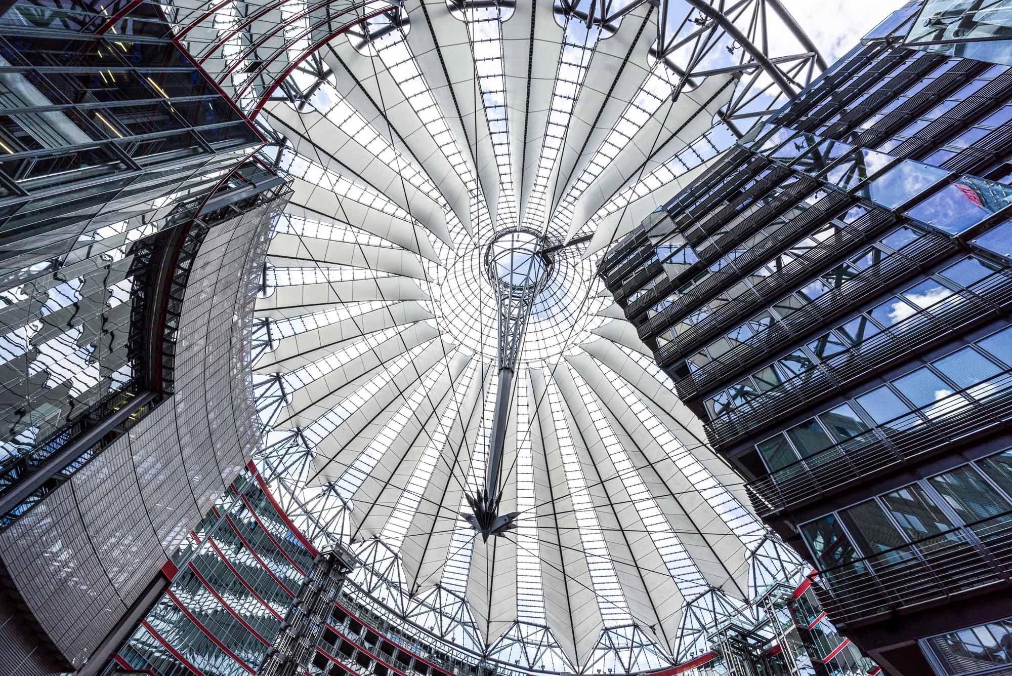 Looking up at a glass atrium canopy, interior and architectural property photography